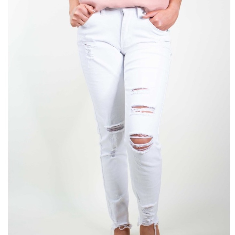 White distressed denim, skinny jeans.
